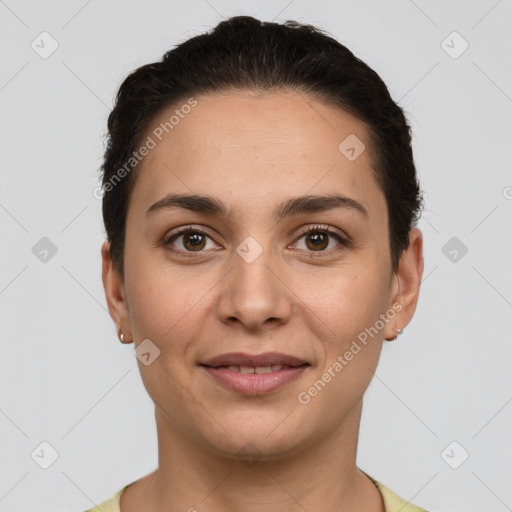 Joyful white young-adult female with short  brown hair and brown eyes