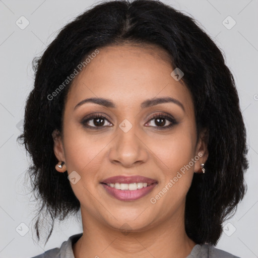 Joyful latino young-adult female with medium  brown hair and brown eyes