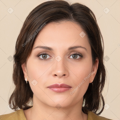 Neutral white young-adult female with medium  brown hair and brown eyes