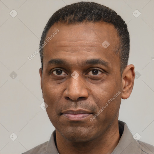 Neutral latino adult male with short  black hair and brown eyes