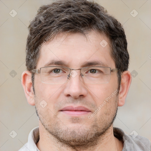 Neutral white adult male with short  brown hair and brown eyes