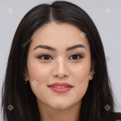 Joyful asian young-adult female with long  brown hair and brown eyes