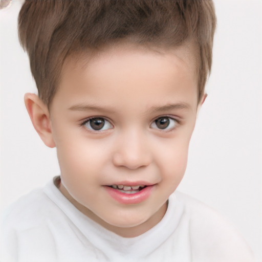 Joyful white child male with short  brown hair and brown eyes