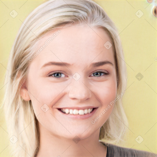 Joyful white young-adult female with medium  brown hair and blue eyes