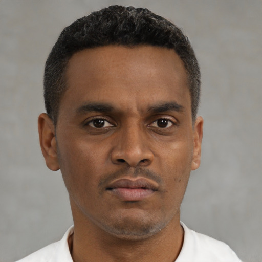 Neutral black young-adult male with short  brown hair and brown eyes