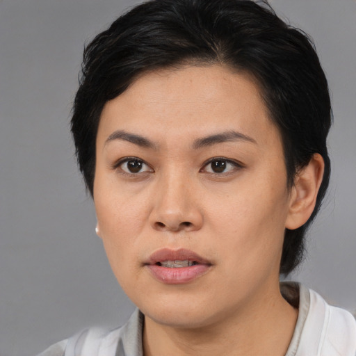 Neutral asian young-adult female with short  black hair and brown eyes
