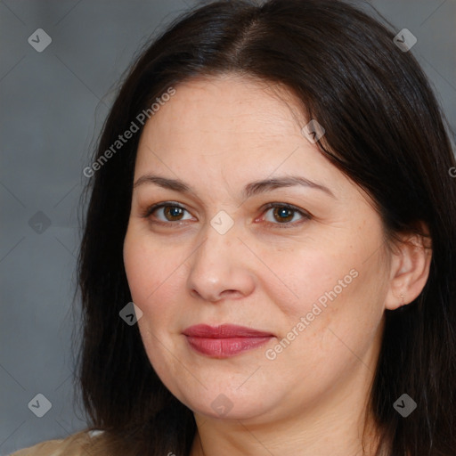 Joyful white adult female with medium  brown hair and brown eyes