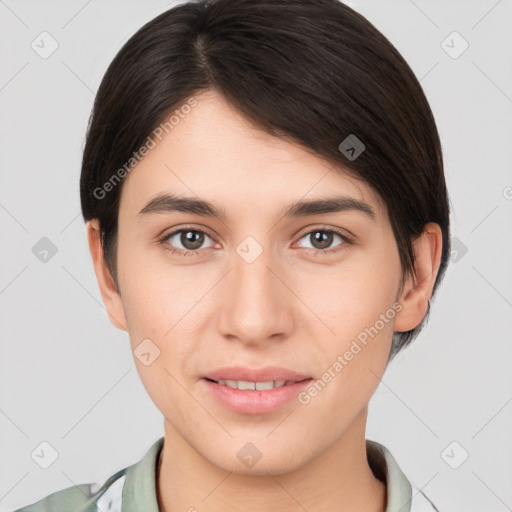 Joyful white young-adult female with short  brown hair and brown eyes