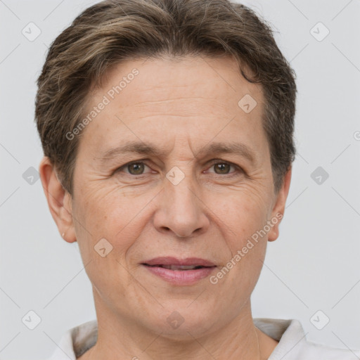 Joyful white adult female with short  brown hair and brown eyes