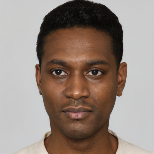 Neutral black young-adult male with short  black hair and brown eyes