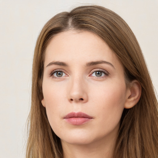 Neutral white young-adult female with long  brown hair and grey eyes