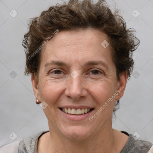 Joyful white adult female with short  brown hair and brown eyes