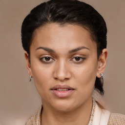 Joyful latino young-adult female with short  brown hair and brown eyes