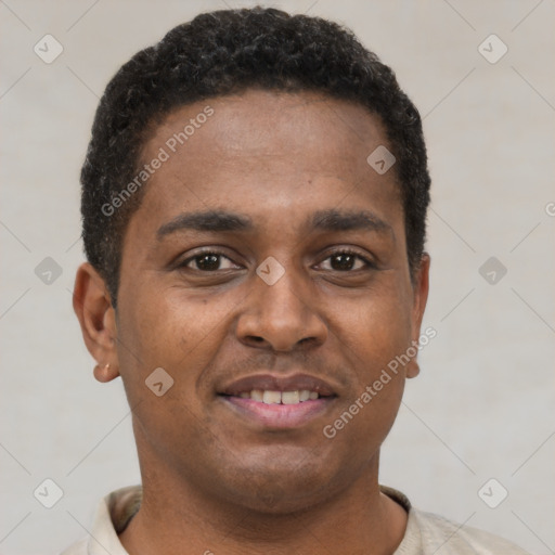 Joyful latino young-adult male with short  brown hair and brown eyes