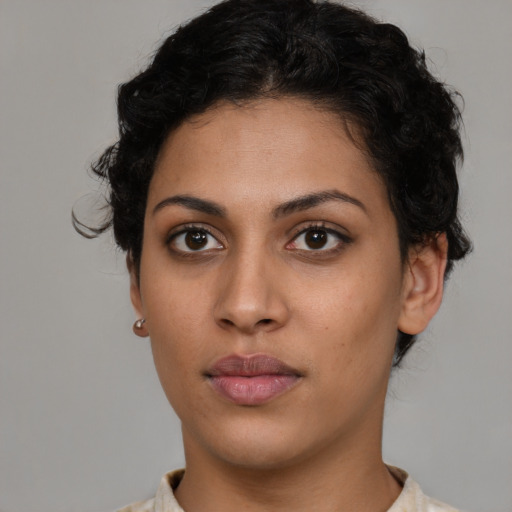 Neutral latino young-adult female with short  brown hair and brown eyes