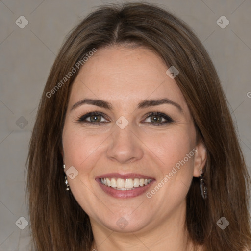 Joyful white adult female with medium  brown hair and brown eyes