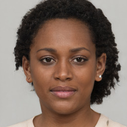 Neutral black young-adult female with short  brown hair and brown eyes