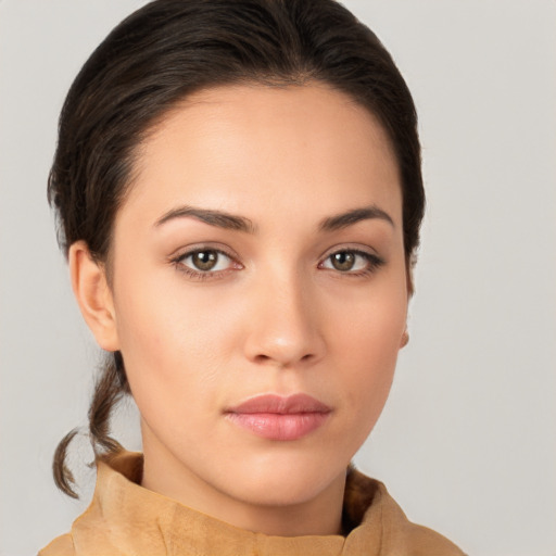 Neutral white young-adult female with short  brown hair and brown eyes