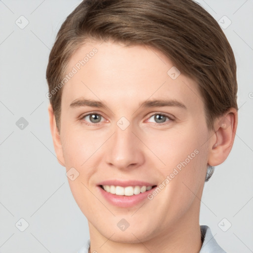 Joyful white young-adult female with short  brown hair and grey eyes