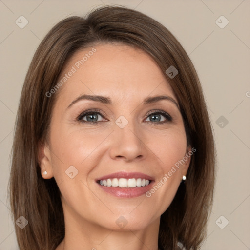 Joyful white young-adult female with medium  brown hair and green eyes