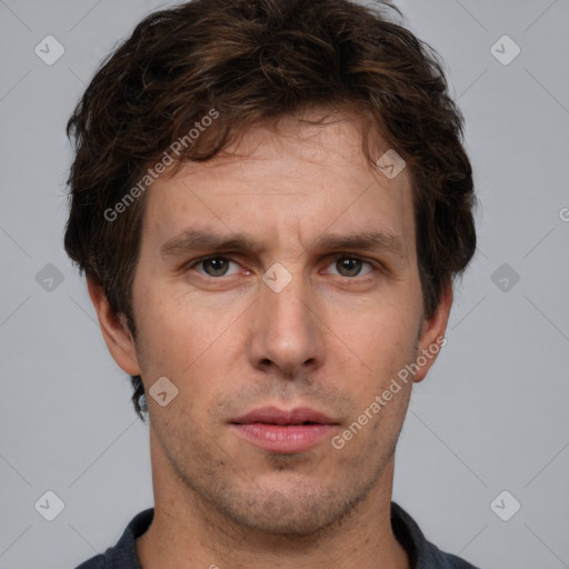 Neutral white adult male with short  brown hair and brown eyes