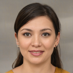 Joyful white young-adult female with medium  brown hair and brown eyes