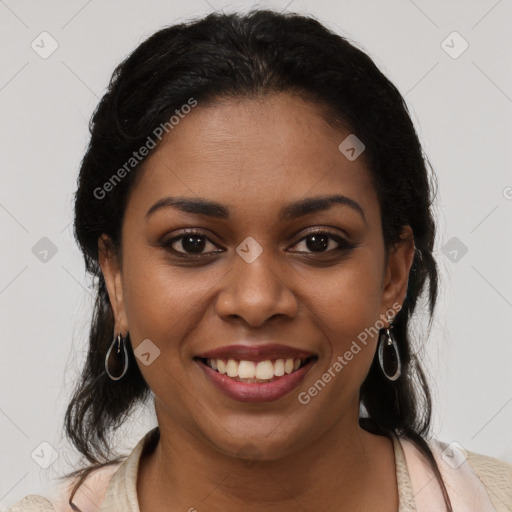 Joyful black young-adult female with medium  brown hair and brown eyes