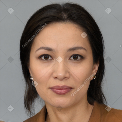 Joyful white adult female with medium  brown hair and brown eyes