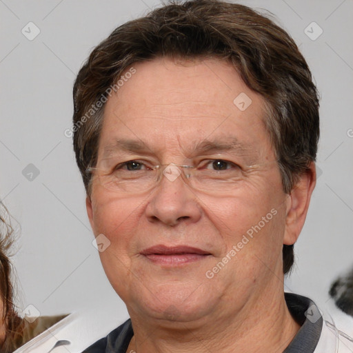 Joyful white middle-aged male with short  brown hair and brown eyes