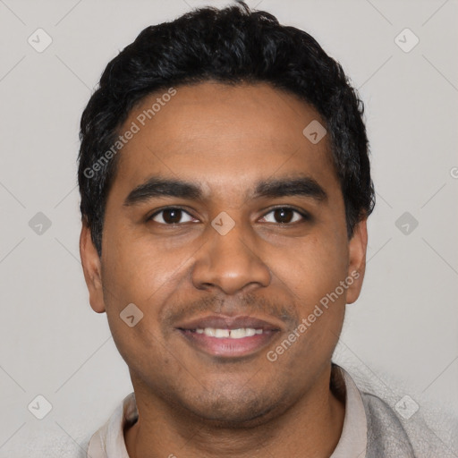 Joyful latino young-adult male with short  black hair and brown eyes