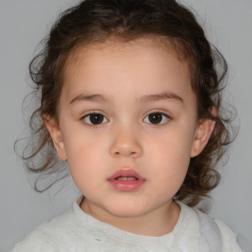 Neutral white child female with medium  brown hair and brown eyes