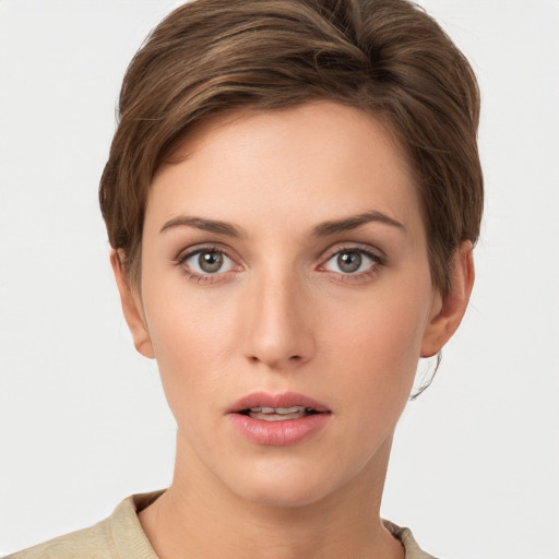 Neutral white young-adult female with short  brown hair and grey eyes