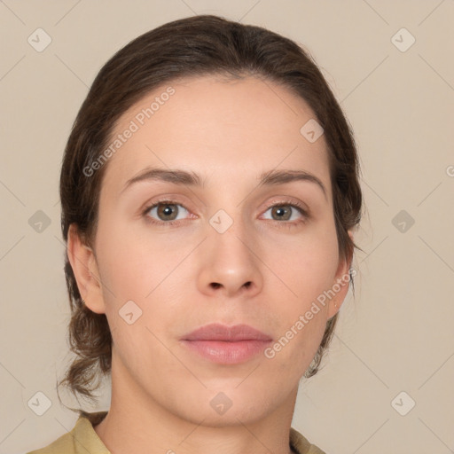 Neutral white young-adult female with medium  brown hair and brown eyes