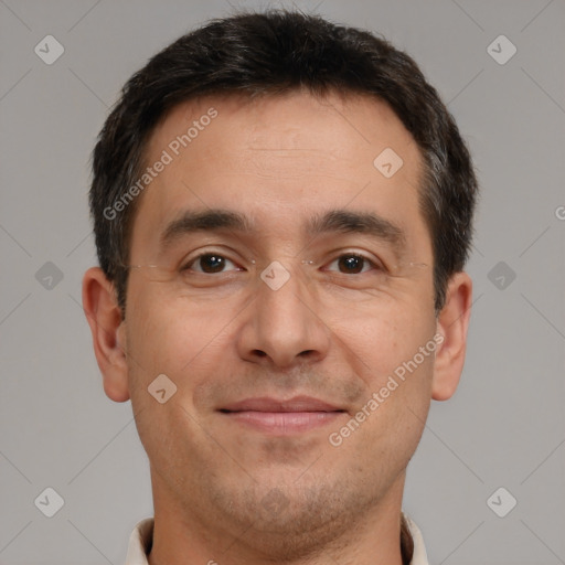 Joyful white adult male with short  brown hair and brown eyes