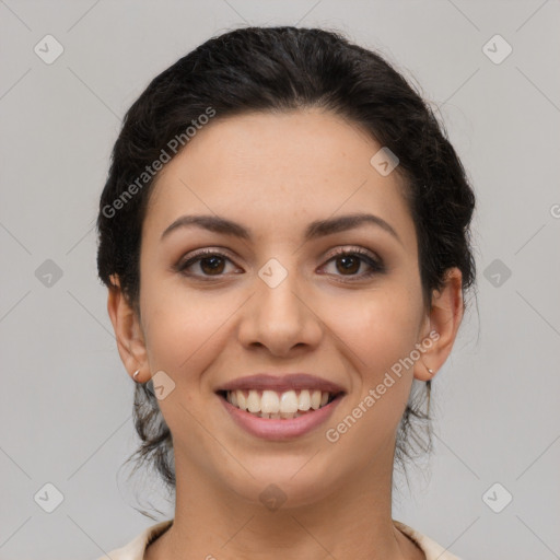 Joyful latino young-adult female with medium  brown hair and brown eyes