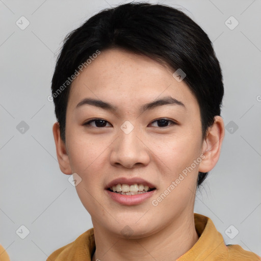 Joyful asian young-adult female with short  black hair and brown eyes