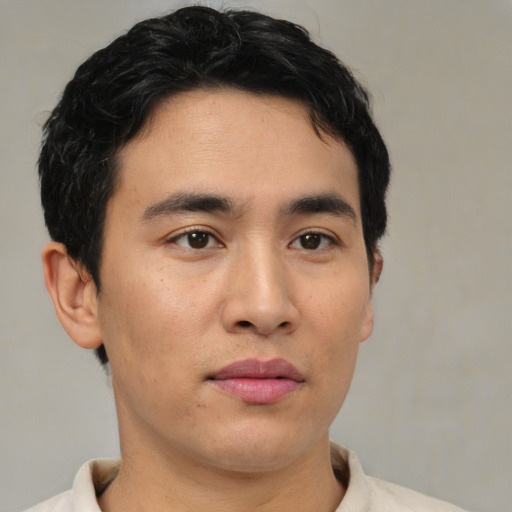 Neutral asian young-adult male with short  brown hair and brown eyes
