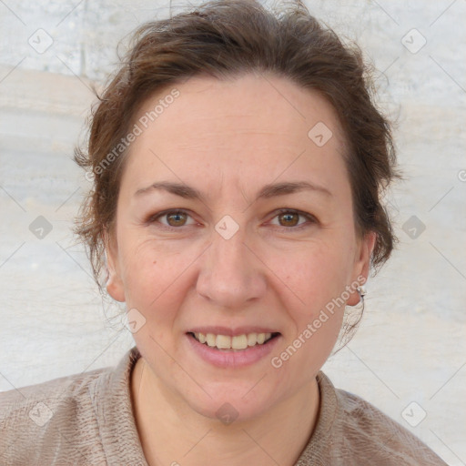 Joyful white adult female with short  brown hair and brown eyes