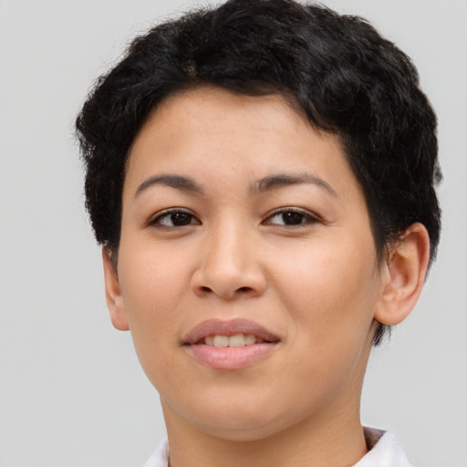 Joyful asian young-adult female with short  brown hair and brown eyes