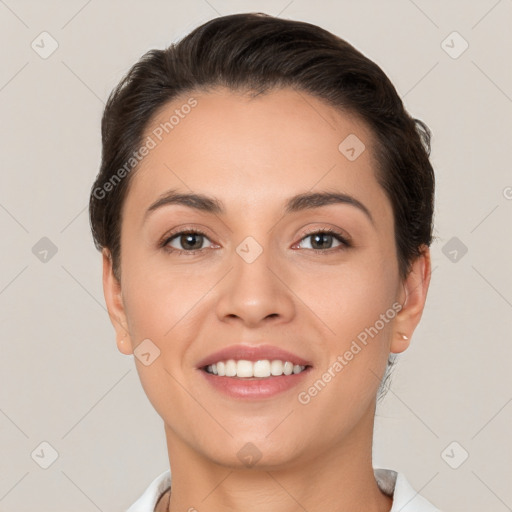 Joyful white young-adult female with short  brown hair and brown eyes