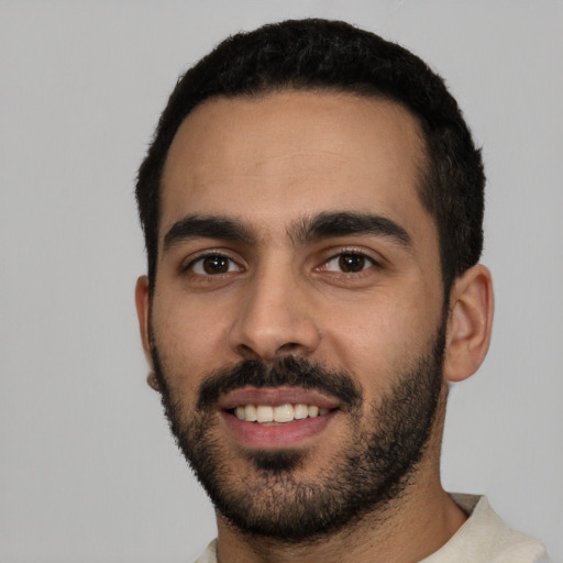Neutral latino young-adult male with short  black hair and brown eyes