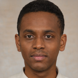 Neutral black young-adult male with short  black hair and brown eyes