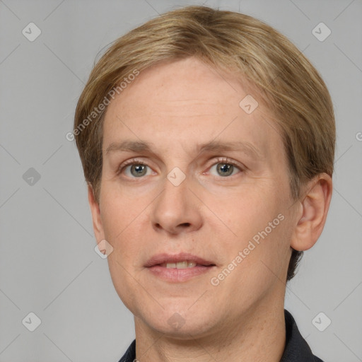 Joyful white adult male with short  brown hair and grey eyes