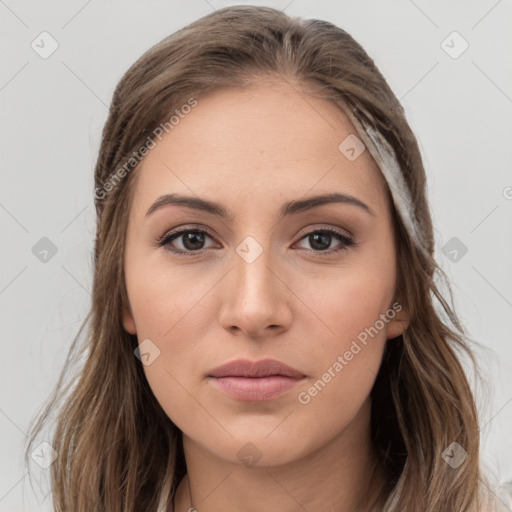 Neutral white young-adult female with long  brown hair and brown eyes