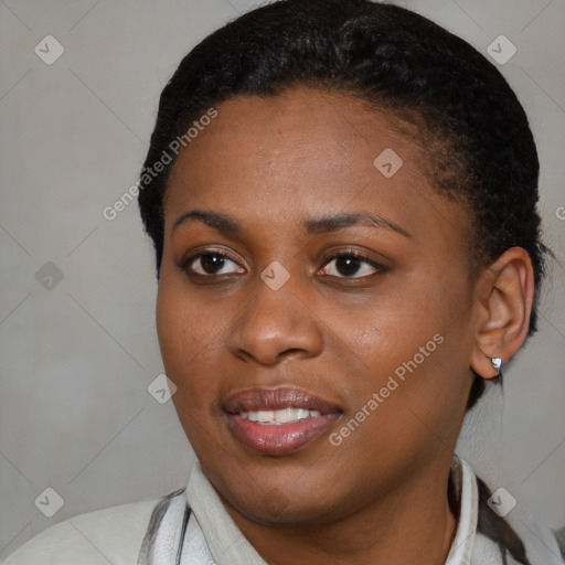 Joyful black young-adult female with medium  black hair and brown eyes