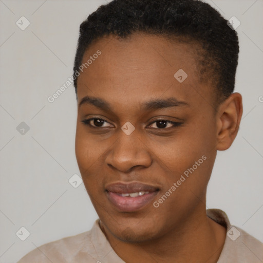 Joyful black young-adult male with short  black hair and brown eyes
