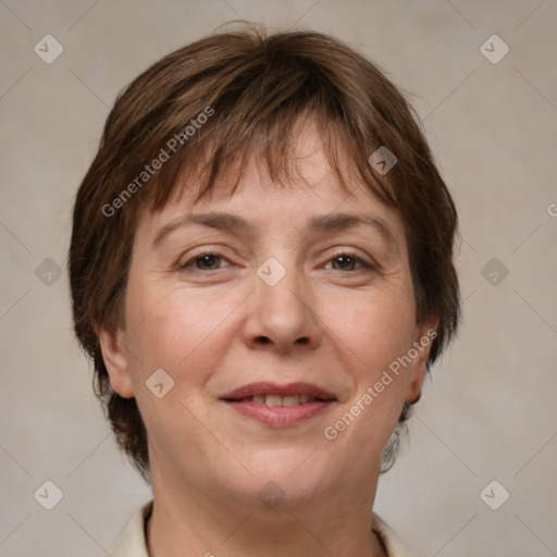 Joyful white adult female with medium  brown hair and grey eyes