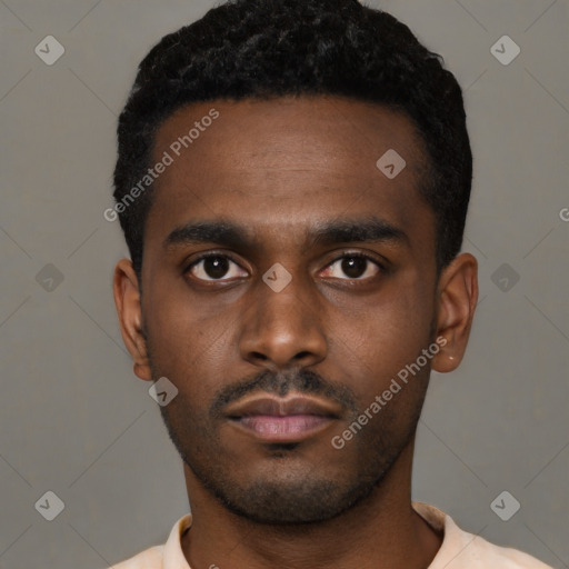 Neutral latino young-adult male with short  black hair and brown eyes