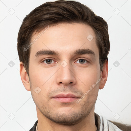 Neutral white young-adult male with short  brown hair and grey eyes