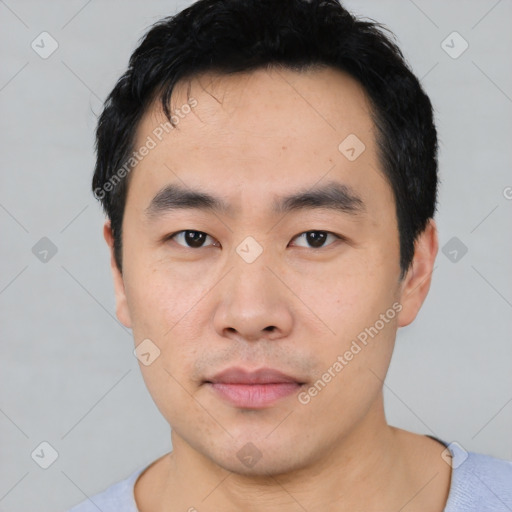 Neutral asian young-adult male with short  black hair and brown eyes